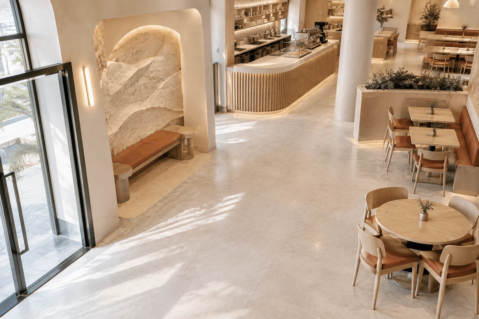 hospitality interior design dubai cafe with sculpted feature wall and warm wood seating